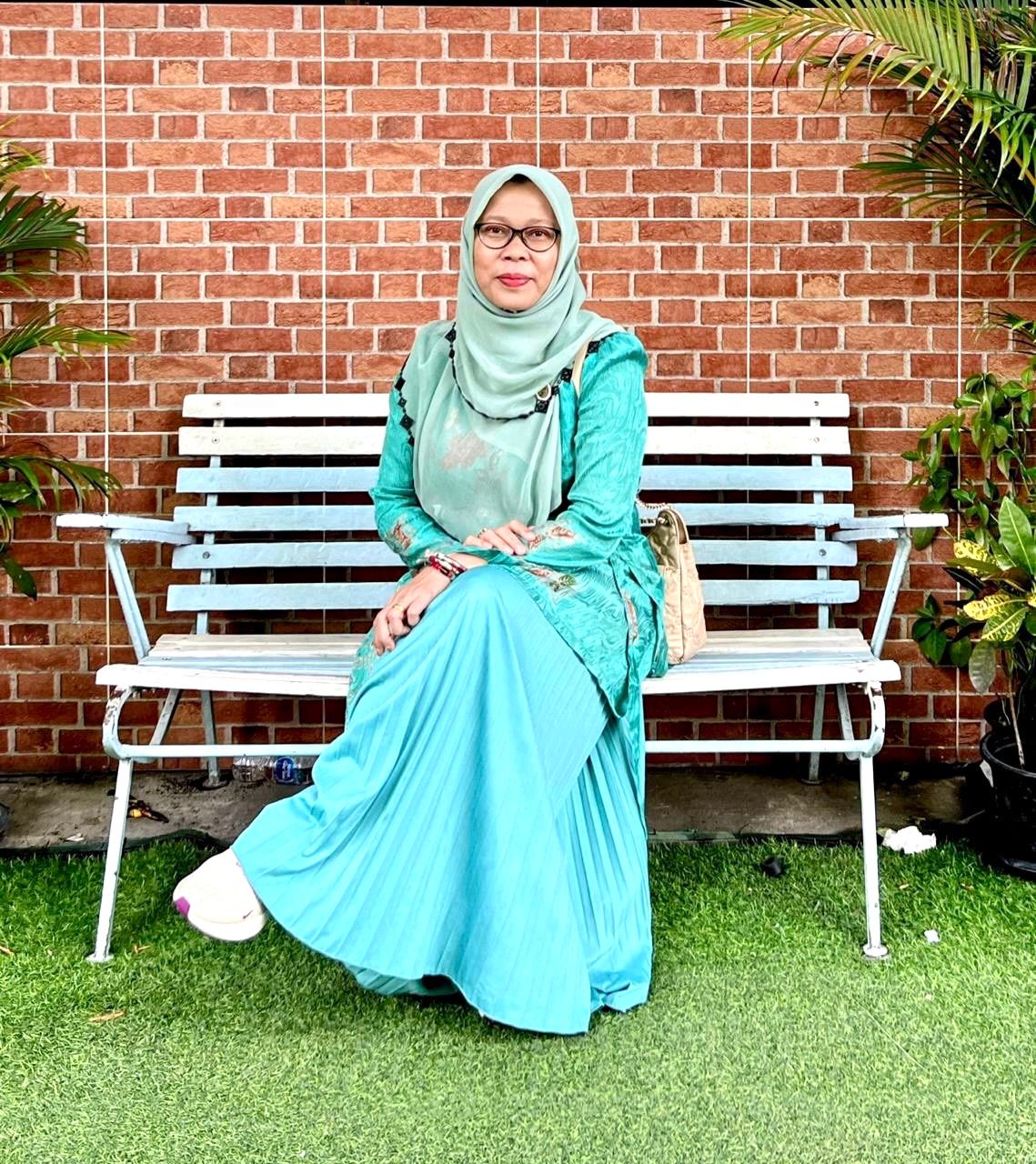 Dr syafrida Hani .S.E.M.Si